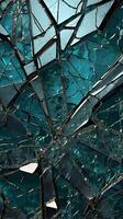A macro photograph of fractured glass with fine, intersecting cracks. photo