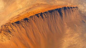 Aerial view of mars-like desert canyon with layered erosion patterns photo