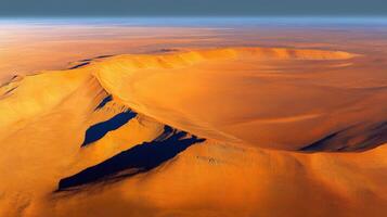 Expansive natural desert landscape with majestic sand dunes and crater features photo