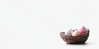 Three multicolored eggs in a woven basket on white background photo