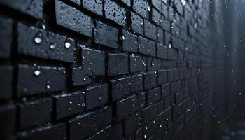 Rain drops on a brick wall in the dark photo