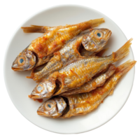 Small fried fish served on a transparent plate, perfect for a light meal or appetizer at any gathering, small fried fish in plate on transparent background png
