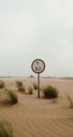 A sign in the desert with a bicycle on it video