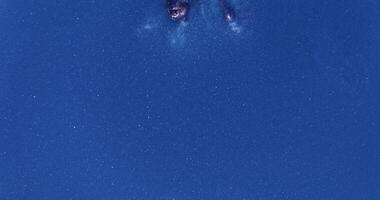 A large blue object in the sky with two lights video