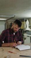 A man is working on a project video