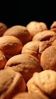 Walnut nuts food, closeup of walnut nut texture on black background, nuts on black background video
