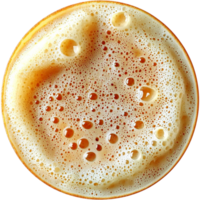 Frothy coffee with a creamy golden surface in a round cup png