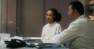A doctor and a patient in a room video