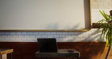 A man standing in front of a laptop computer video