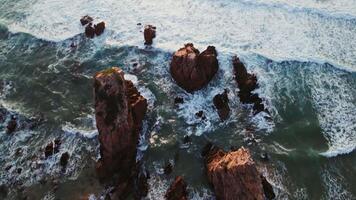 An aerial view of the ocean and rocks video