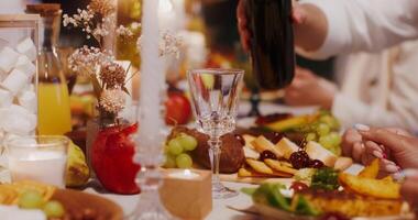 A table with food and wine on it video