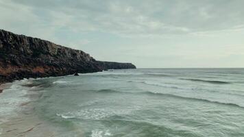 A view of the ocean and cliffs from above video