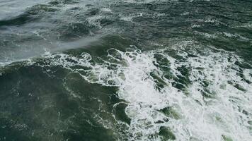 An aerial view of a boat in the ocean video
