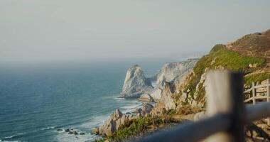 Panoramic view of the sea washing the rocky shores and ledges. View from the top of the mountain from the observation deck video
