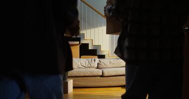 A person standing in front of a couch video
