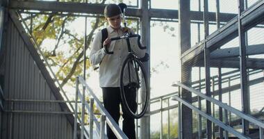 A man with a bicycle on a stairway video