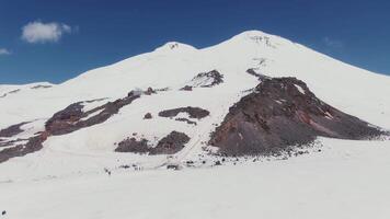 A large mountain with snow on top video