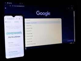INDONESIA, PEKANBARU, 28.2.2025. The concept of using the DeepSeek AI assistant application as a search engine on laptops and Android photo
