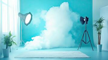 Studio Setup with Artificial Cloud in Blue Backdrop Featuring Lighting Equipment and Indoor Plants for Photography photo