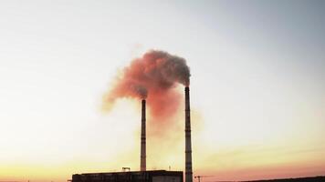 Drone view of pipes factory smoke. Aerial view of industrial zone with factory emission from factory pipes video