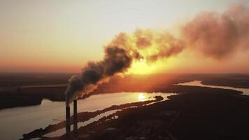 Plant with smoking smokestack. Problem of environmental pollution by factories video