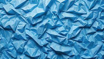 Intricate Blue Crumpled Paper Texture Creates an Abstract and Visually Dynamic Backdrop photo