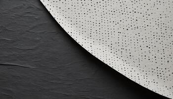 Textured Black Slate Background with a Curved Edge Gray Dotted Abstract Overlay photo
