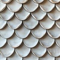 Decorative metallic scales create a shimmering wall design photo