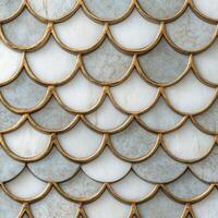 Decorative tile pattern with shell-like design in grey and gold photo