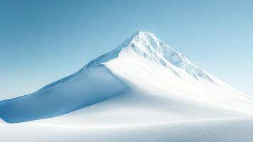 Snow-covered mountain rises in clear blue sky photo
