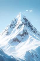 Majestic snow-capped mountain peak under a clear blue sky photo