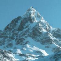 Majestic snow-capped mountain peak under clear blue sky photo