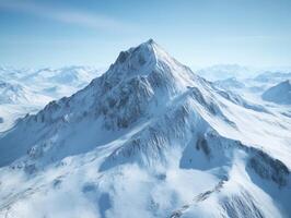 Majestic snow-capped mountain range under clear blue sky photo