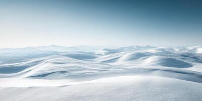 Snowy landscape under a clear sky in winter photo