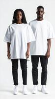 Models showcase casual fashion with oversized white shirts photo