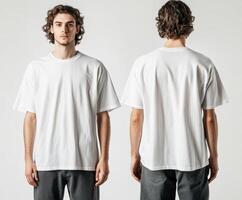 Young man wearing a white t-shirt in a neutral setting photo