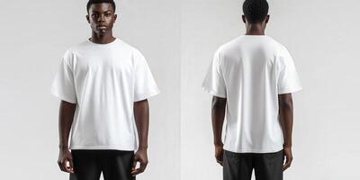 Stylish young man models white oversized shirt from side photo
