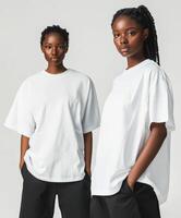 Stylish models showcasing casual white t-shirts indoors photo