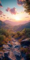 Mountain valley at sunset with colorful clouds and greenery photo