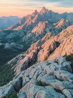 Mountain landscape at sunset with rocky formations in view photo