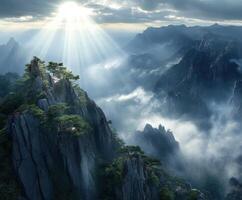 The sun shines over the mountains in china photo