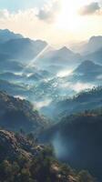 Stunning view of misty mountains at dawn in a valley photo