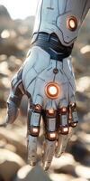 Cyborg hand with glowing elements in a futuristic setting photo