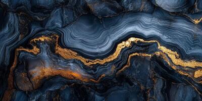 Elegant blue and gold marble pattern with intricate swirls photo