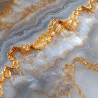Elegant gold and gray marble pattern with intricate details photo