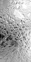 Surface features of icy celestial body captured in detail photo