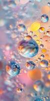Water droplets on a surface with colorful bubbles photo