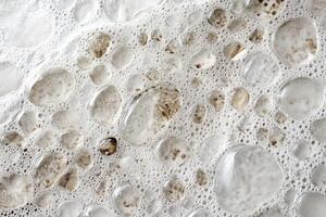 Bubbles form a textured surface in close-up view photo