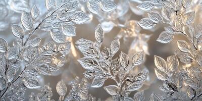 Frosted leaves creating a delicate winter pattern photo