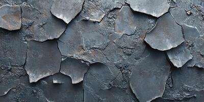 Cracked gray surface with textured pattern and layers photo